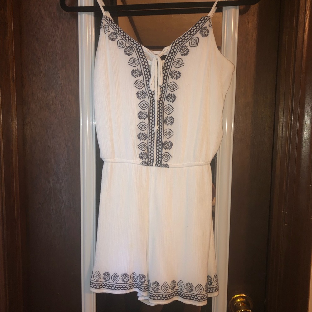 White with black detailing romper